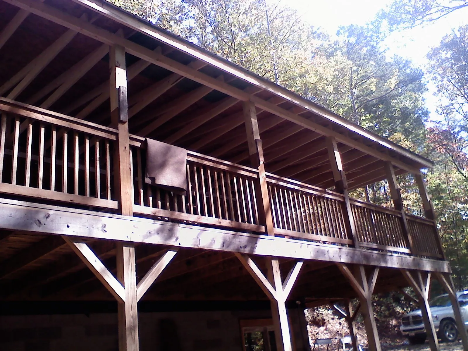 Timber framing under a new elevated porch and deck in Breckenridge